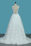 2024 sangles robes de mariée en dentelle une ligne avec tour de taille perlée dos ouvert