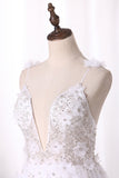 2024 Spaghetti Straps Robes de mariée A Line Tulle With Beads and Handmade Flower