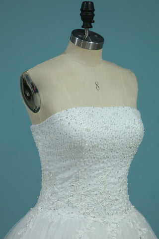 Robes de mariage de Tulle de robe de boule sans bretelles 2024 avec des perles et Applique