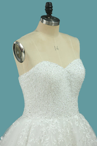 2024 Sweetheart Organza A robes de mariage en ligne avec Applique et perles Train de balayage